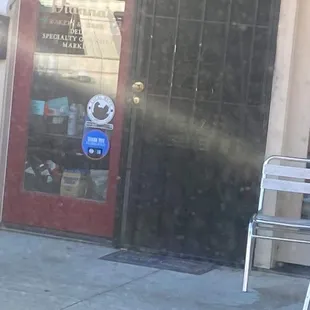 Car Window View of the Entrance to Diana's Cafe