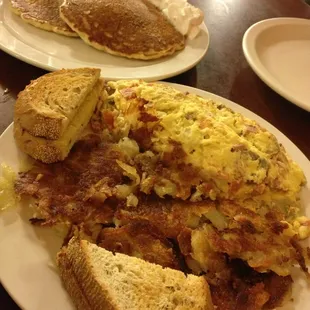 Blueberry pancakes and a crazy omelette at 1AM.