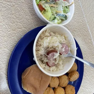 Smoked Sausage and Kraut with side salad and squash.