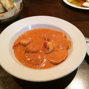 Lobster and shrimp ravioli in vodka pink cream sauce.