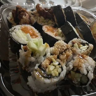 a tray of sushi on a table