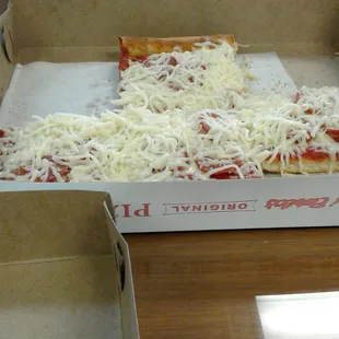 a slice of pizza in a box