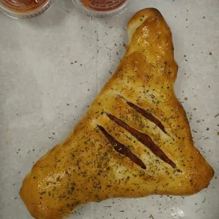 a piece of bread with a slice cut out of it