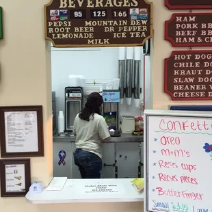 a woman in a kitchen