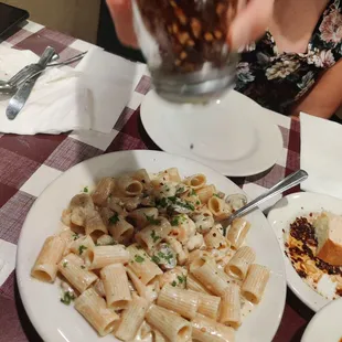 a plate of pasta and sauce