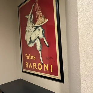 a poster of a woman in a hat