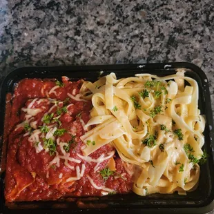 Mezzo mezzo lasagna and fettuccine alfredo paid extra for fettuccine hardly any sauce on fettuccine no no