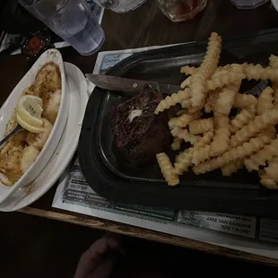 Combination of broiled scallops and tenderloin