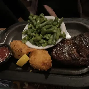 Combination of stuffed shrimp and tenderloin