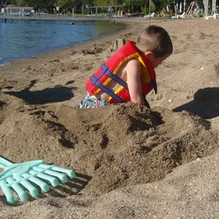 Digging in the beach at the resort