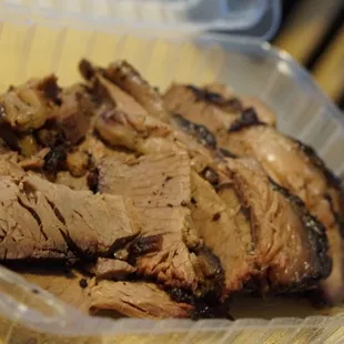 pork in a plastic container