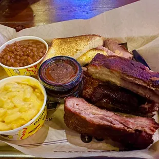 Three meat plates, brisket, ribs, pulled pork. Amazing.