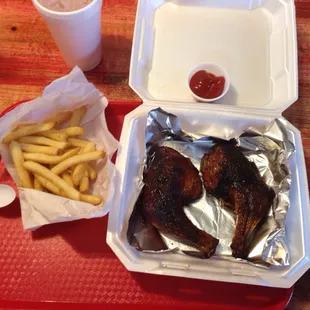 This is 2 dark chicken 1/4&apos;s and fries with a sweet iced tea