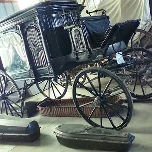 Late 1800's horse-drawn hearse, with coffins