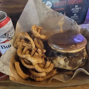 Smash burger with bacon jam and onion straws