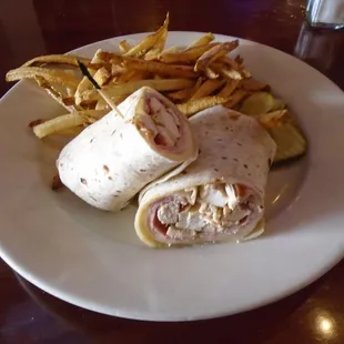 Chicken cordon bleau wrap with fries - the chicken was dry as hell.
