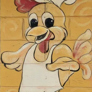 Don't know what this chicken is so happy about.  Best to not tell him.