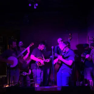 a group of people playing instruments