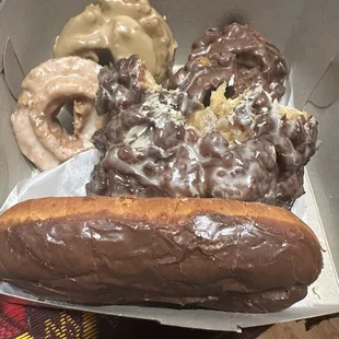 The oversized eclair with the huge apple fritter behind it. There's a huge piece missing because, well, it was good!