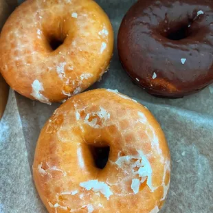 Glazed and chocolate iced donuts