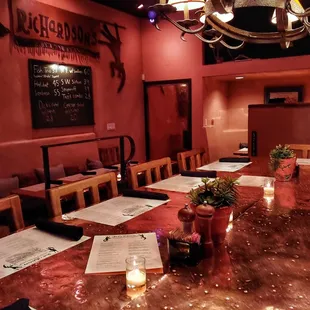 a dining room with tables and chairs