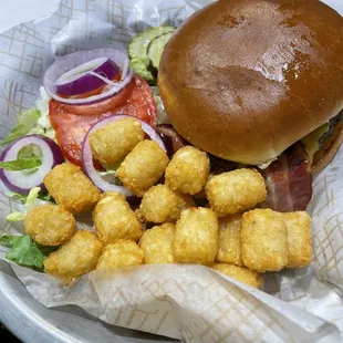 a burger and tater tots