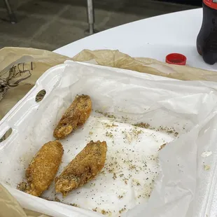 fried chicken wings and a coke