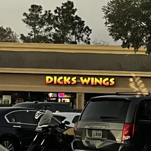 a motorcycle parked in front of the restaurant