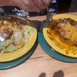 Chili with small salads but huge and delicious