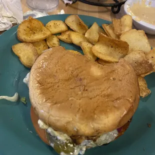Blackened chicken with grilled jalapenos and blue cheese crumbles and a side of potato scoops.