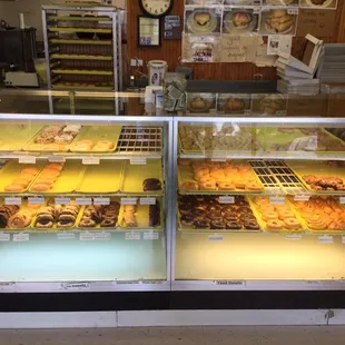 a display case filled with donuts