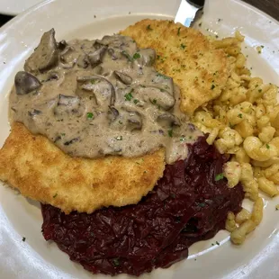 Schnitzel with mushroom gravy, cabbage with apples and spaetzle