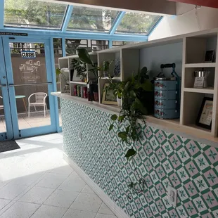 Cute interior, they open up their doors and windows for a natural flow of air