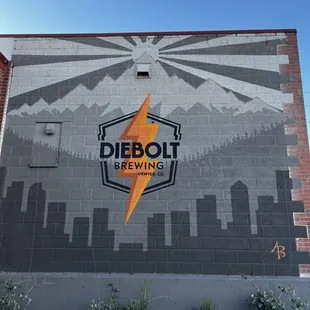 the logo on the side of the building