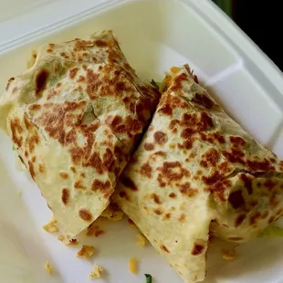 Chicken Burrito with orange Chile sauce.