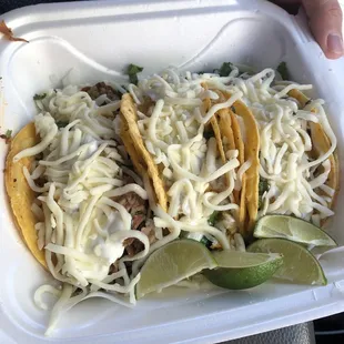 Pork, chicken, and chorizo tacos