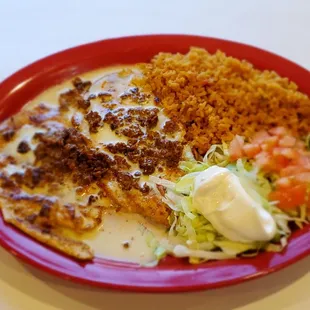 ChoriPollo... chicken breast topped with cheese sauce and chorizo!!!