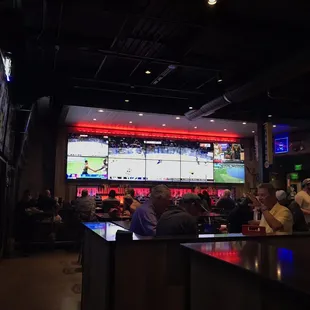 people sitting at the bar