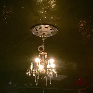 There&apos;s a chandelier made with a hub cap and hand cuffs. Nuff said!