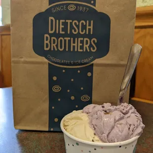 Blueberry pie and butter pecan ice cream backed by a bag of delicious goodies