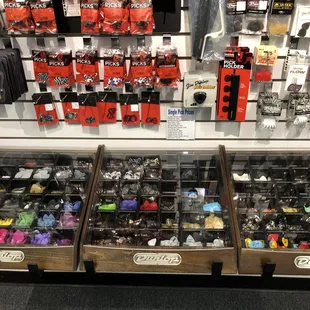 You can pick up and feel picks, unlike Guitar Center. Dietze is a better store all around and support local!
