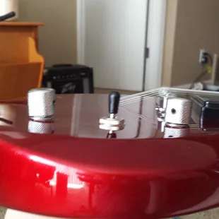 Knob on the left is noticeably crooked which prompted me to open it up.