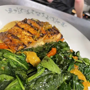 Citrus Salmon with sautéed spinach and roasted tomatoes