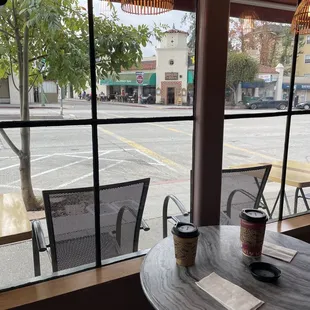 a view of a street through a window