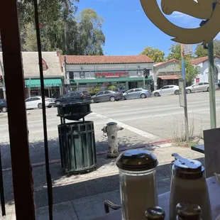 a view of a street through a window