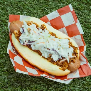 a chili dog with coleslaw