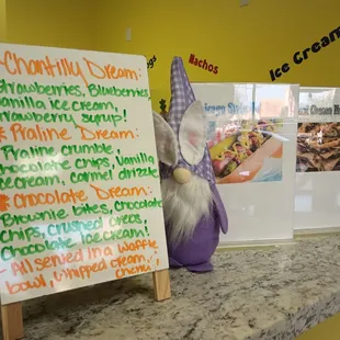 a sign in front of a counter