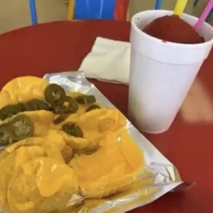 Nachos with jalapeños and tiger blood snowball