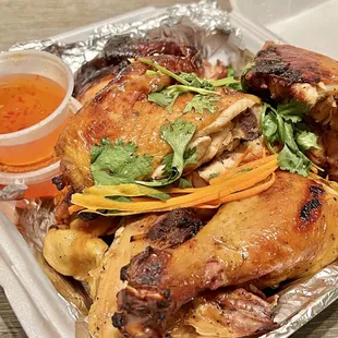 BBQ Chicken. Crispy skin, somewhat dry depending on the cut. Honey plum sauce is addicting. The side of rice is perfectly sticky.