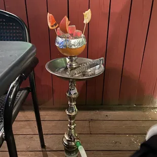 a bird on a hookah